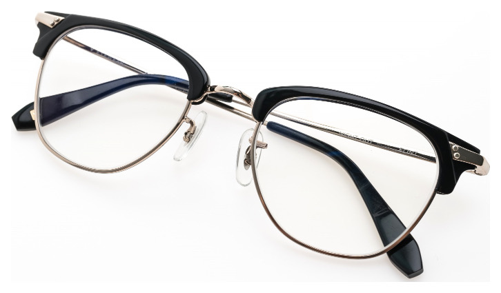 Product photo of a pair of black and silver eyeglasses.